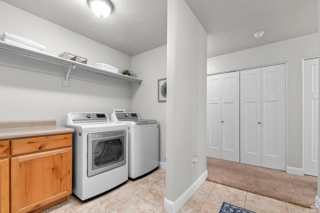 742 W 130 S Unit D, Pleasant Grove, UT 84062 - laundry area with separate washer and dryer, baseboards, and light tile patterned flooring