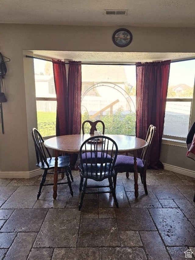3788 S 410 W, Vernal, UT 84078 - dining room with stone tile flooring and baseboards