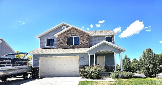 3788 S 410 W, Vernal, UT 84078 - traditional home featuring stone siding, a garage, and driveway