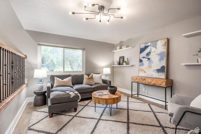10297 S Weeping Willow Dr E, Sandy, UT 84070 - living room with wood finished floors, baseboards, and a chandelier