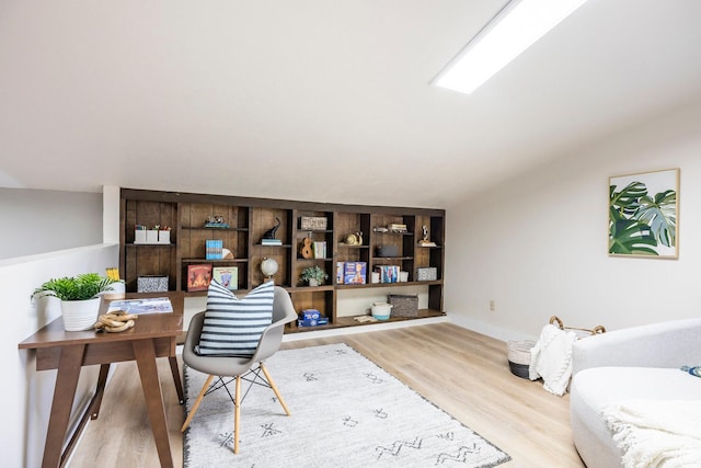 10297 S Weeping Willow Dr E, Sandy, UT 84070 - office area featuring vaulted ceiling, wood finished floors, and baseboards