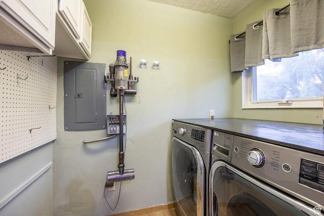 10297 S Weeping Willow Dr E, Sandy, UT 84070 - laundry room with cabinet space, independent washer and dryer, electric panel, and a textured ceiling