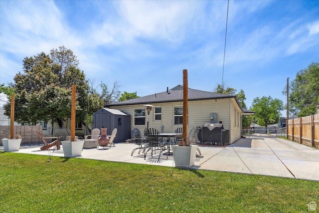 1142 W Fremont Ave, Salt Lake City, UT 84104 - rear view of house featuring a fire pit and a patio area
