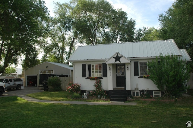 682 W 400 N, Payson, UT 84651 - view of front of property featuring a detached garage, metal roof, and a front yard