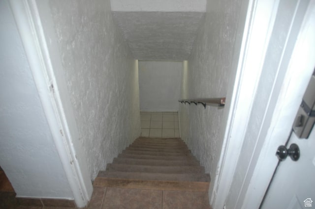682 W 400 N, Payson, UT 84651 - stairway with a textured wall and tile patterned flooring