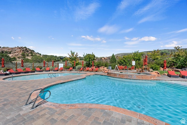 113 N Haystack Mountain Dr Unit 2, Heber City, UT 84032 - community pool with a patio and a mountain view