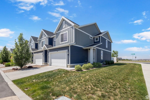 334 E Wren Hill Ln, Saratoga Springs, UT 84045 - view of front facade with board and batten siding, an attached garage, a front lawn, and concrete driveway