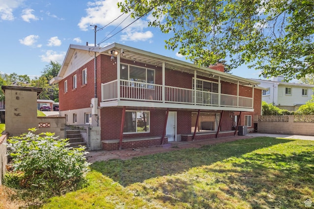 2858 S 50 W, Bountiful, UT 84010 - rear view of house with brick siding, central air condition unit, and a chimney