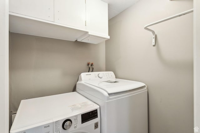 2937 S 900 E, Salt Lake City, UT 84106 - laundry area with cabinet space and washing machine and dryer