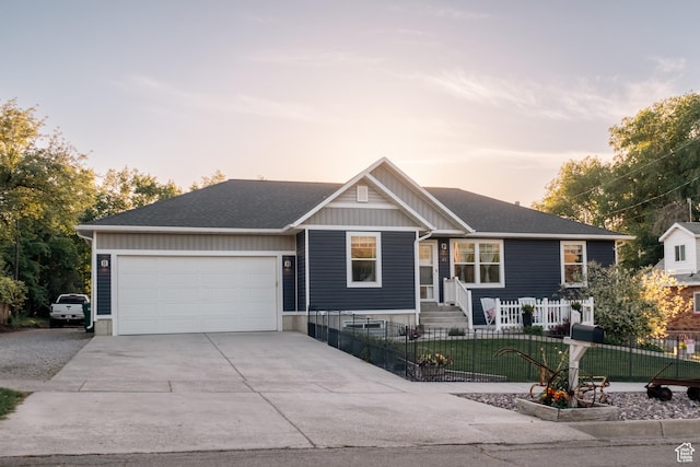 45 N Center St, Hyrum, UT 84319 - single story home with an attached garage, concrete driveway, and a fenced front yard
