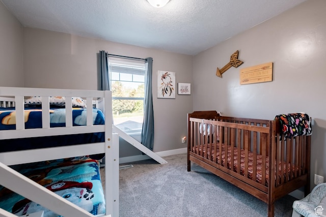 45 N Center St, Hyrum, UT 84319 - carpeted bedroom featuring a textured ceiling and baseboards