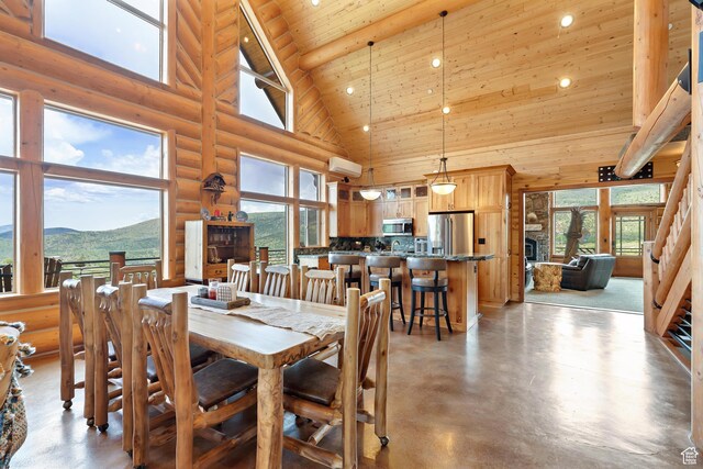 1551 Tree Top Ln Unit 360, Heber City, UT 84032 - dining space featuring high vaulted ceiling, wood ceiling, concrete flooring, recessed lighting, and log walls