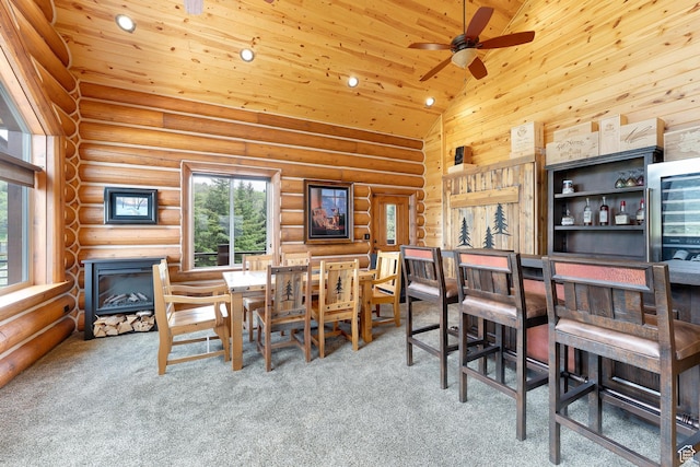 1551 Tree Top Ln Unit 360, Heber City, UT 84032 - carpeted dining area featuring ceiling fan, wooden ceiling, high vaulted ceiling, log walls, and wine cooler