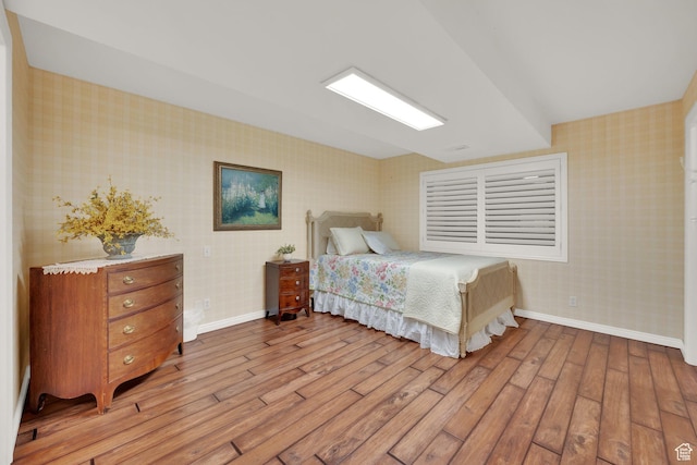 1502 W Cornerstone Dr, South Jordan, UT 84095 - bedroom featuring light wood-style flooring, wallpapered walls, and baseboards