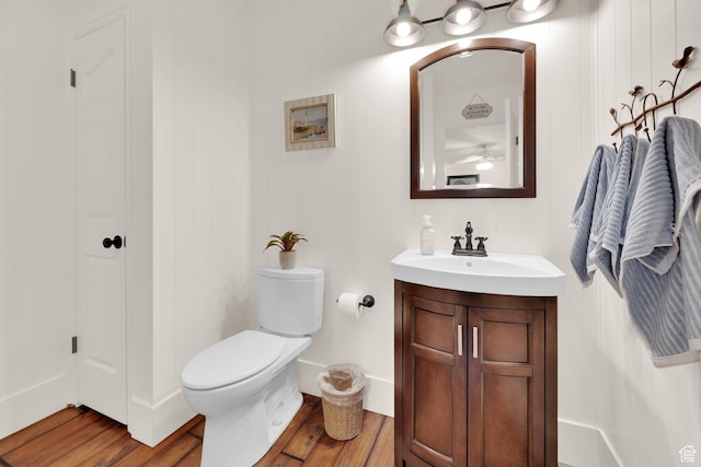 1502 W Cornerstone Dr, South Jordan, UT 84095 - bathroom featuring vanity, wood finished floors, and toilet