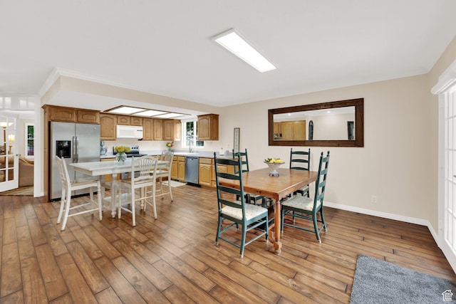 1502 W Cornerstone Dr, South Jordan, UT 84095 - dining room featuring light wood-style flooring and baseboards