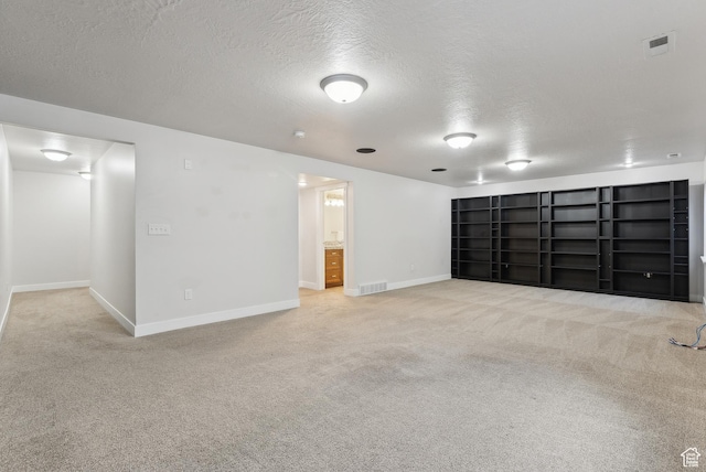 4269 S Haven Park Way, Holladay, UT 84124 - below grade area with a textured ceiling, carpet flooring, and baseboards