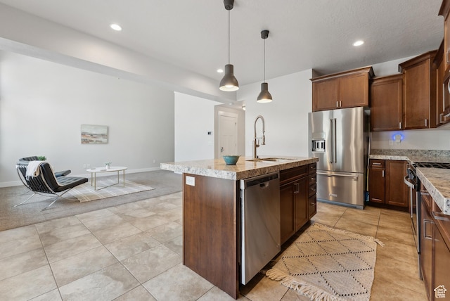 4269 S Haven Park Way, Holladay, UT 84124 - kitchen with stainless steel appliances, a sink, a kitchen island with sink, recessed lighting, and pendant lighting
