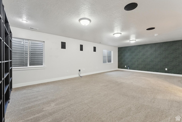 4269 S Haven Park Way, Holladay, UT 84124 - unfurnished room featuring carpet, baseboards, a textured ceiling, and wallpapered walls