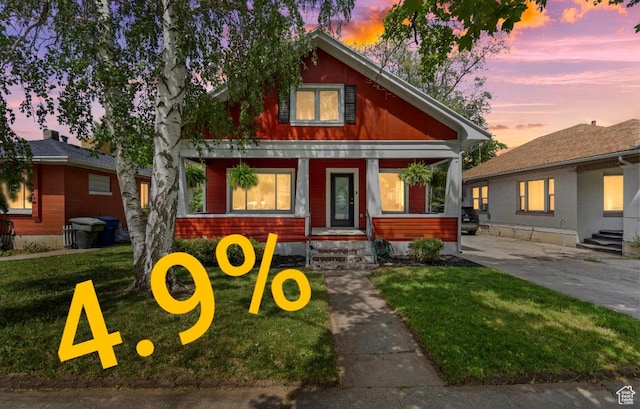 2955 S Jefferson Ave E, Ogden, UT 84403 - bungalow-style house featuring covered porch and a front yard