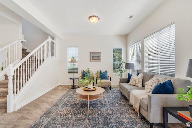 14069 S Rutherford Ave W, Bluffdale, UT 84065 - living room featuring stairway, plenty of natural light, carpet, and baseboards