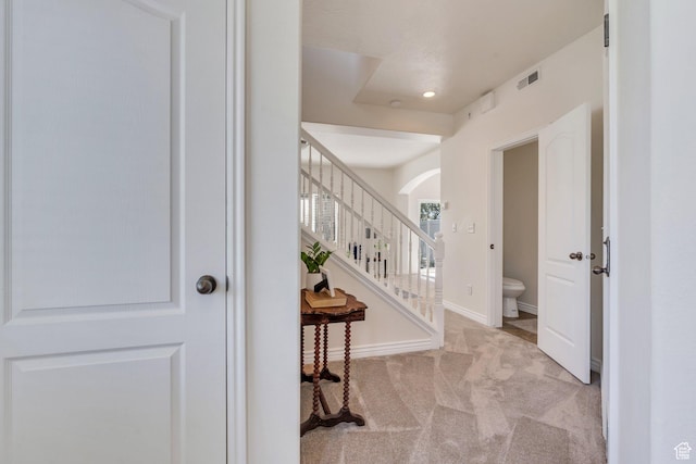 14069 S Rutherford Ave W, Bluffdale, UT 84065 - entryway with carpet, arched walkways, recessed lighting, baseboards, and stairway