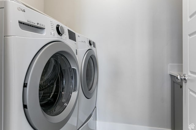 1065 S 425 W, Farmington, UT 84025 - washroom with washing machine and clothes dryer and cabinet space