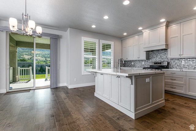 1065 S 425 W, Farmington, UT 84025 - kitchen featuring stainless steel range oven, plenty of natural light, baseboards, backsplash, and recessed lighting