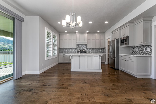 1065 S 425 W, Farmington, UT 84025 - kitchen featuring stainless steel appliances, light countertops, decorative backsplash, a chandelier, and recessed lighting