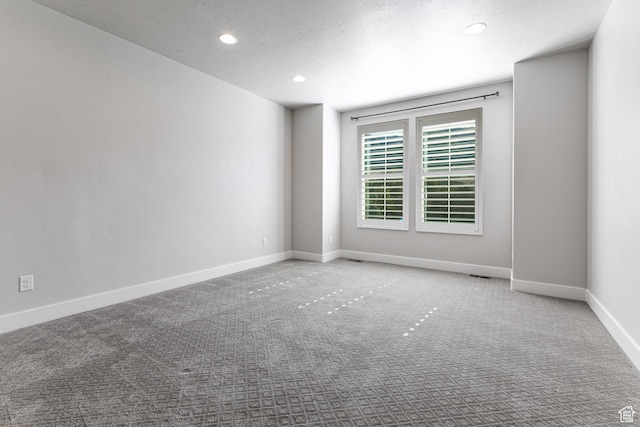 1065 S 425 W, Farmington, UT 84025 - carpeted spare room with recessed lighting, baseboards, and a textured ceiling