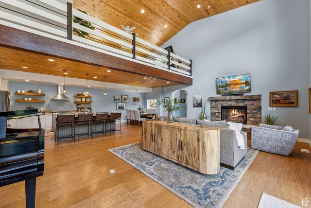 705 Parkview Dr, Summit Park, UT 84098 - living room featuring light wood finished floors, wooden ceiling, a fireplace, recessed lighting, and high vaulted ceiling