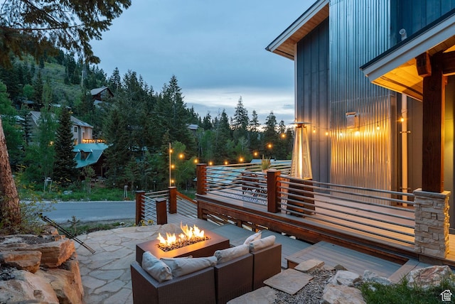 705 Parkview Dr, Summit Park, UT 84098 - view of patio / terrace with an outdoor living space with a fire pit