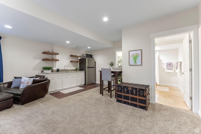 705 Parkview Dr, Summit Park, UT 84098 - tiled living area with carpet flooring, bar with sink, and recessed lighting