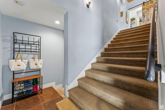 705 Parkview Dr, Summit Park, UT 84098 - stairs featuring baseboards, a barn door, recessed lighting, and tile patterned floors