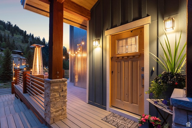 705 Parkview Dr, Summit Park, UT 84098 - doorway to property featuring board and batten siding and a porch