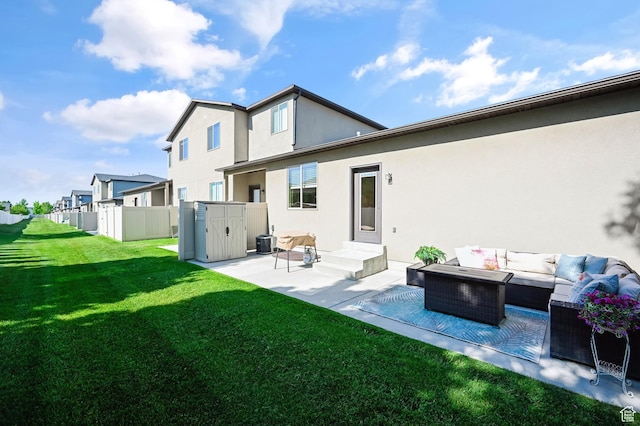 658 S 150 E, Smithfield, UT 84335 - rear view of house featuring outdoor lounge area, a patio area, stucco siding, and a residential view