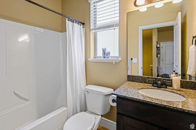 658 S 150 E, Smithfield, UT 84335 - full bath with toilet, vanity, shower / bathtub combination with curtain, and baseboards