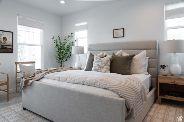 7017 W S Jordan Pkwy, South Jordan, UT 84009 - bedroom featuring multiple windows and recessed lighting