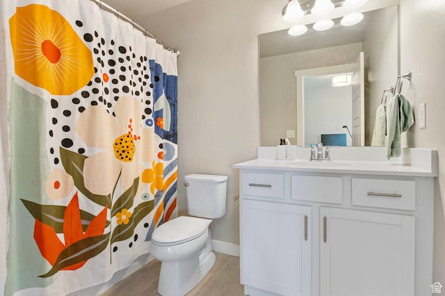 1295 E Granite Peak Rd, Eagle Mountain, UT 84005 - bathroom with toilet, vanity, baseboards, tile patterned flooring, and a shower with curtain
