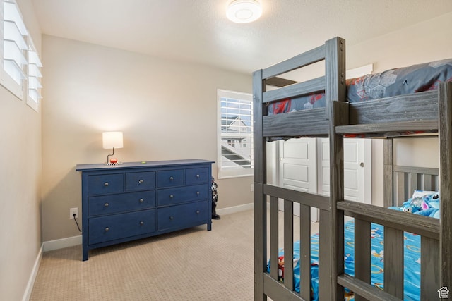 1295 E Granite Peak Rd, Eagle Mountain, UT 84005 - bedroom with light carpet and baseboards