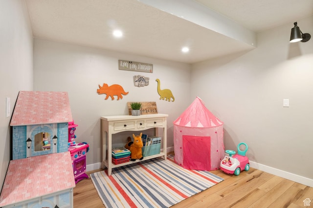 1295 E Granite Peak Rd, Eagle Mountain, UT 84005 - recreation room featuring wood finished floors, baseboards, and recessed lighting