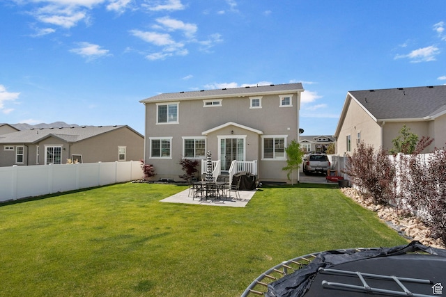 1295 E Granite Peak Rd, Eagle Mountain, UT 84005 - rear view of property featuring a patio area and stucco siding