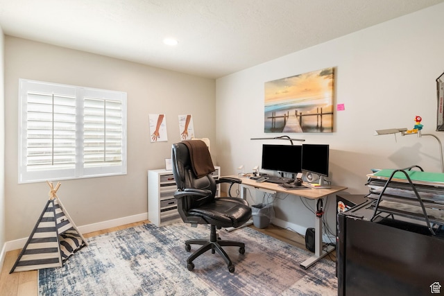 1295 E Granite Peak Rd, Eagle Mountain, UT 84005 - office with wood finished floors, baseboards, and recessed lighting