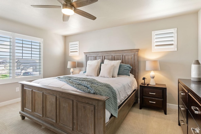 1295 E Granite Peak Rd, Eagle Mountain, UT 84005 - bedroom with light carpet, baseboards, multiple windows, and ceiling fan
