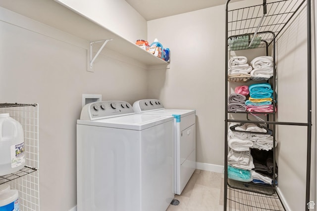 1295 E Granite Peak Rd, Eagle Mountain, UT 84005 - washroom with independent washer and dryer and baseboards