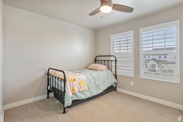 1295 E Granite Peak Rd, Eagle Mountain, UT 84005 - carpeted bedroom featuring baseboards and ceiling fan