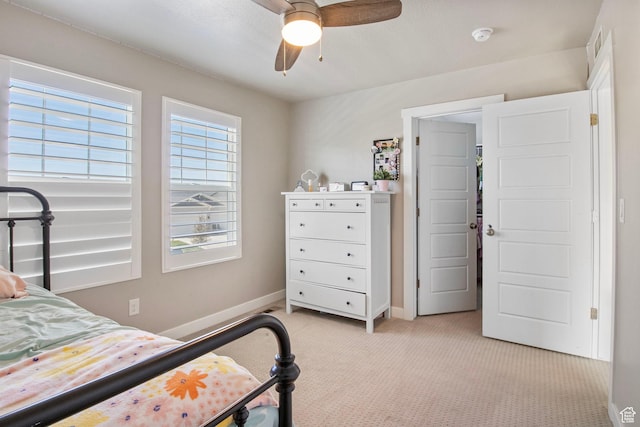 1295 E Granite Peak Rd, Eagle Mountain, UT 84005 - bedroom with light carpet, baseboards, and a ceiling fan