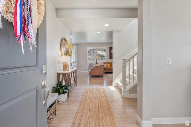 1295 E Granite Peak Rd, Eagle Mountain, UT 84005 - entryway with wood finished floors, stairs, baseboards, and recessed lighting