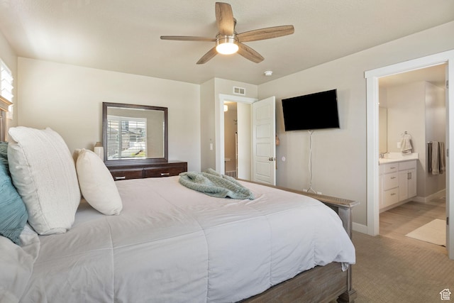 1295 E Granite Peak Rd, Eagle Mountain, UT 84005 - bedroom with light carpet, ensuite bath, a sink, and a ceiling fan