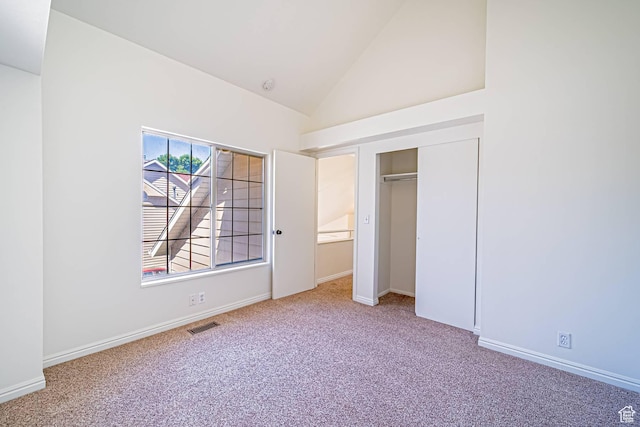 5457 S Break Water Dr W, Taylorsville, UT 84123 - unfurnished bedroom featuring carpet, high vaulted ceiling, a closet, and baseboards